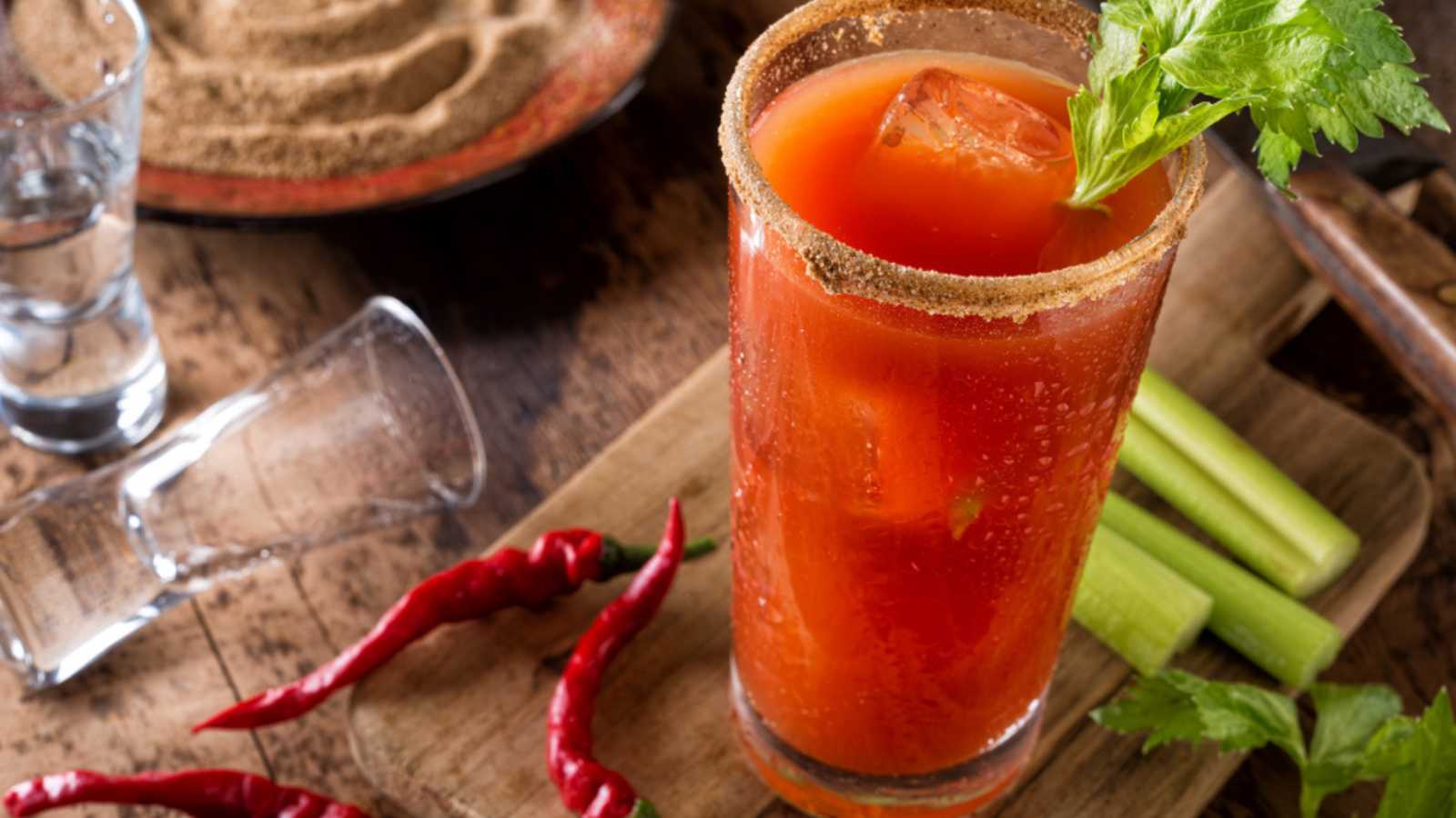 A delicious spicy bloody caesar cocktail with vodka, tomato juice, clam juice, hot sauce and celery.
