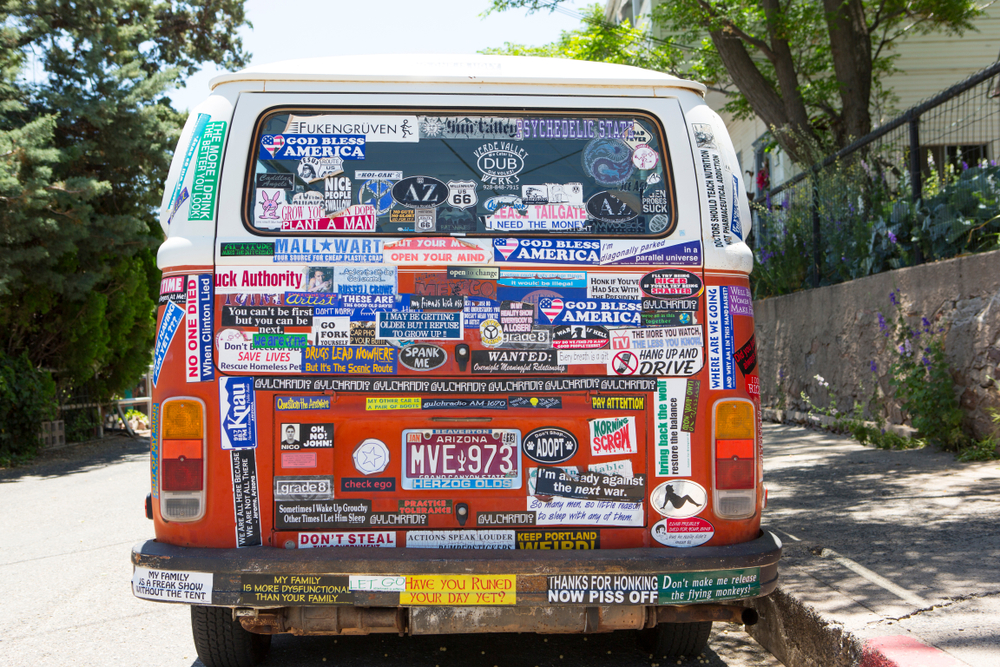 Van covered with bumper stickers