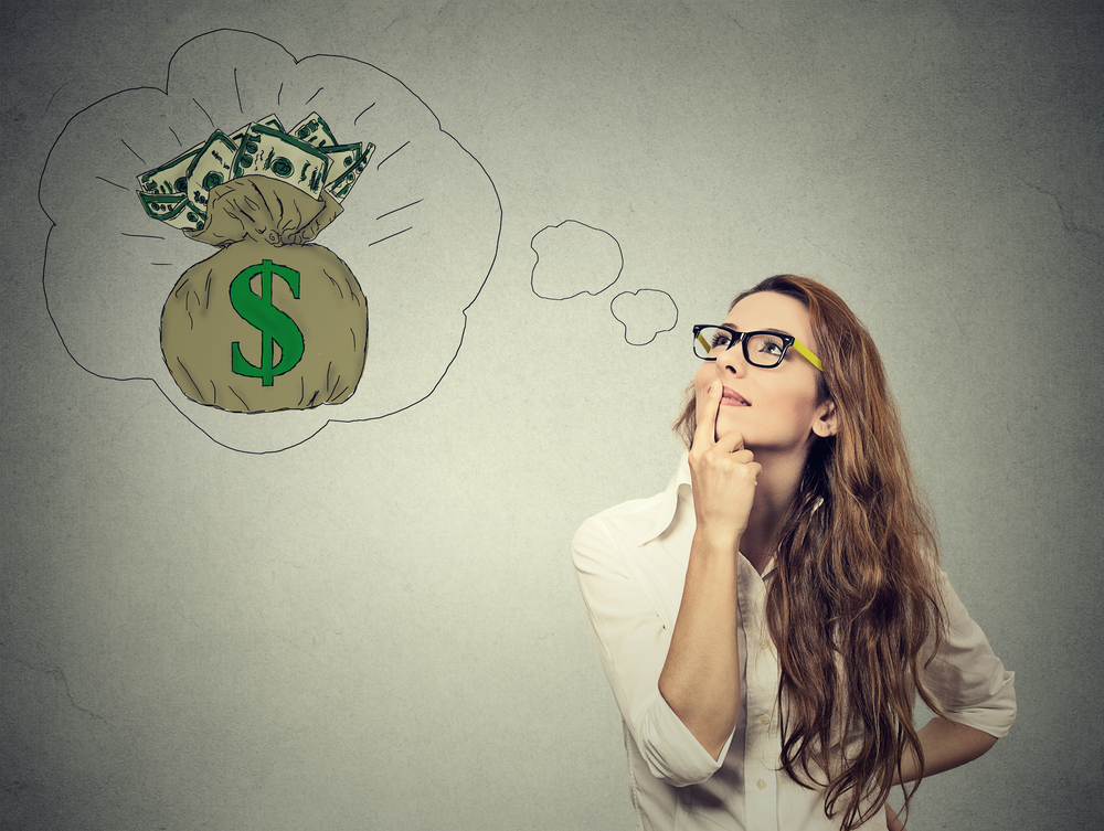 Woman thinking with money bag in thought cloud.
